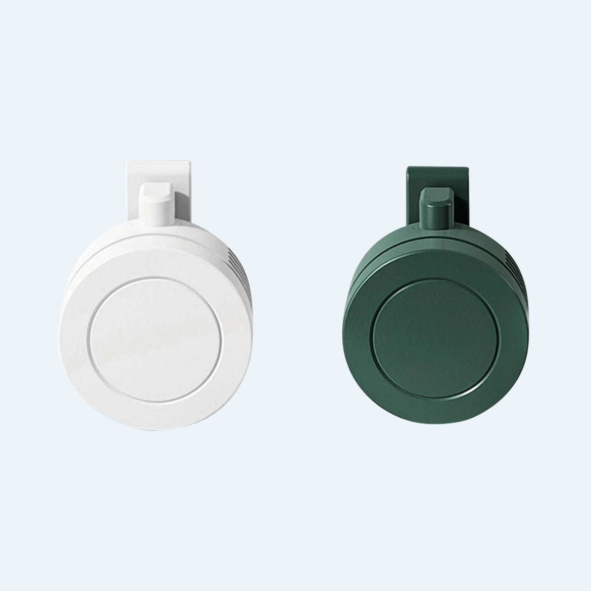 White and green mini clip fans side by side