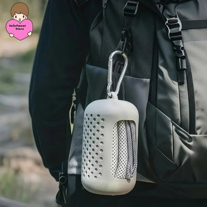 Silicone carry case with carabiner clipped to a bag handle